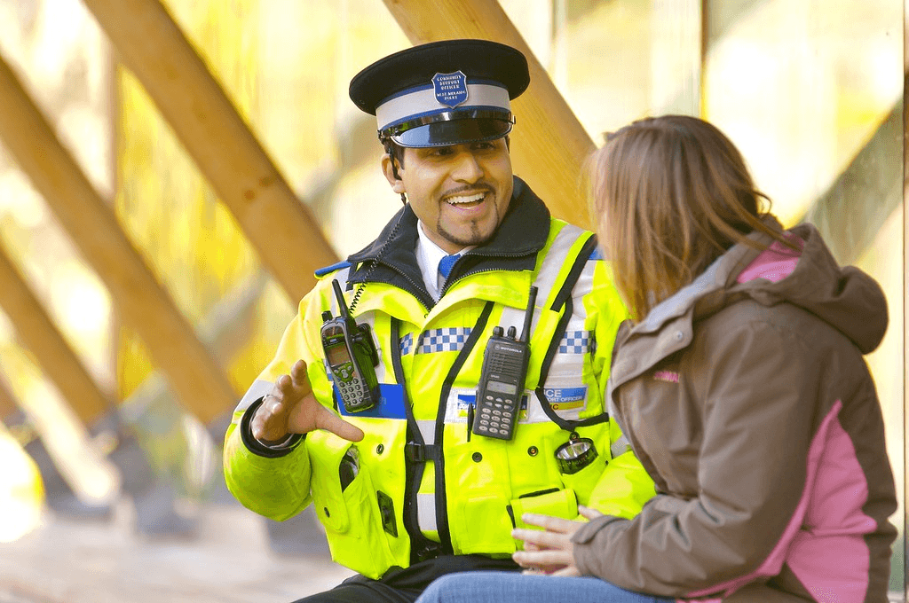 Image of a PCSO talking to a member of the public