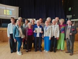Monday club volunteers with award